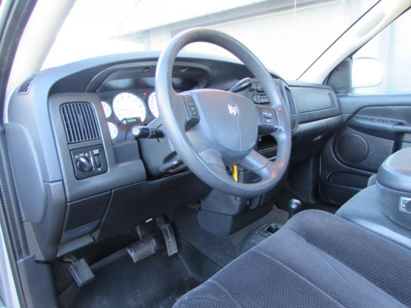 2005 Silver /Gray Dodge Ram 1500 SLT (1D7HU18D15S) with an 5.7 Hemi V8 engine engine, 5 speed automatic transmission, located at 4562 State Avenue, Billings, MT, 59101, (406) 896-9833, 45.769516, -108.526772 - 2005 Dodge Ram 1500 SLT Quad Cab Short Bed 4WD 5.7L V8 OHV 16V Hemi Engine - 5 speed automatic transmission - 4 wheel drive - 159,014 miles SLT package - air conditioning - tilt wheel - cruise control - AM/FM/CD audio - power windows and door locks - power drivers seat - privacy glass - keyles - Photo#12